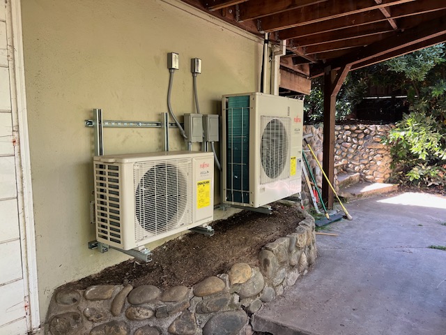 Dual Fujitsu mini-split outdoor units installed by Cozy Conditions